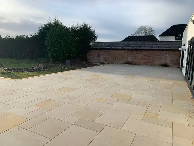 Large buff sandstone patio