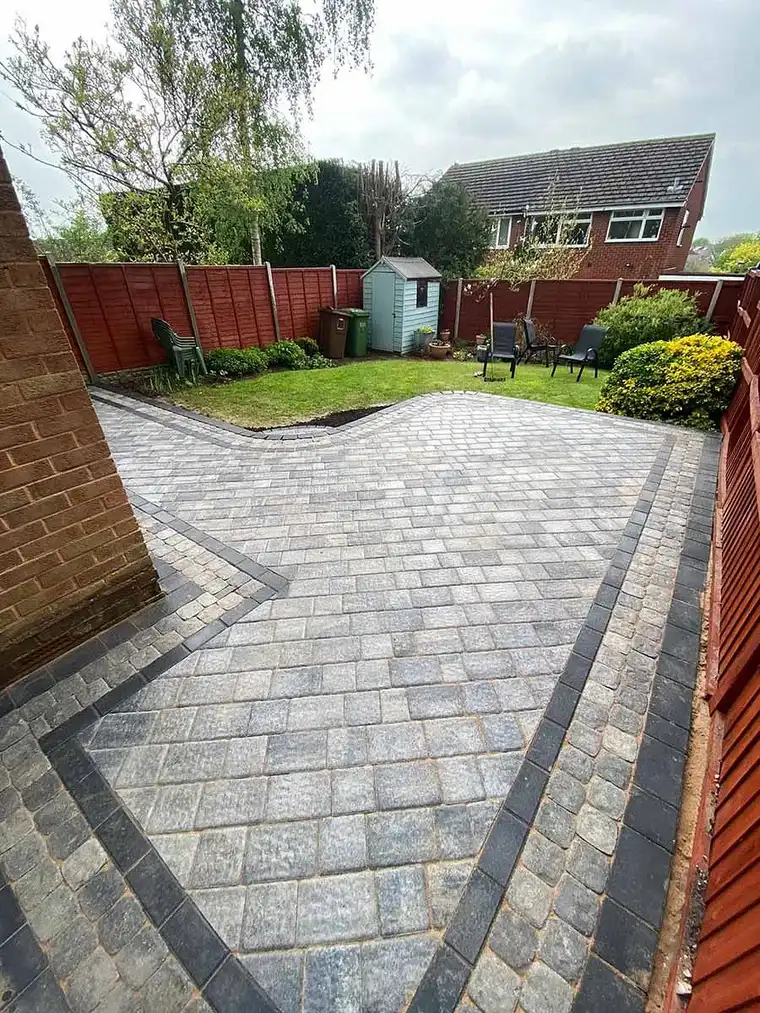 Grey cobble-effect block paving with charcoal edging